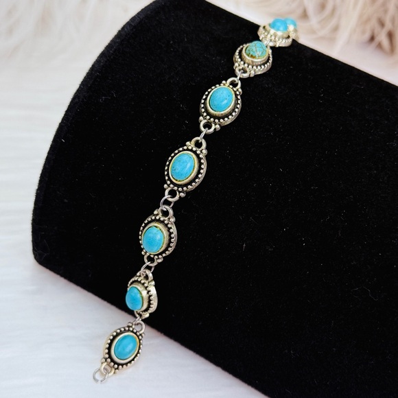 Aged Silvertone, blue raised faux turquoise blue southwestern style bracelet